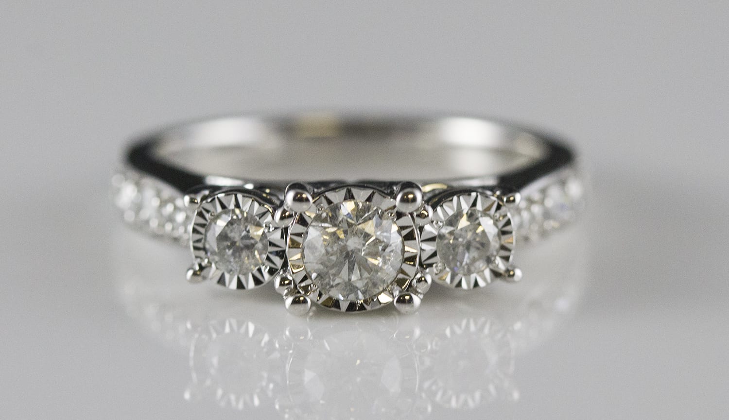 14k White Gold Engagement Ring W 3 Rbc Diamonds Set In Illusion Heads And Diamond Melee In Gallery And Down Shank F331 James Mchone Jewelry